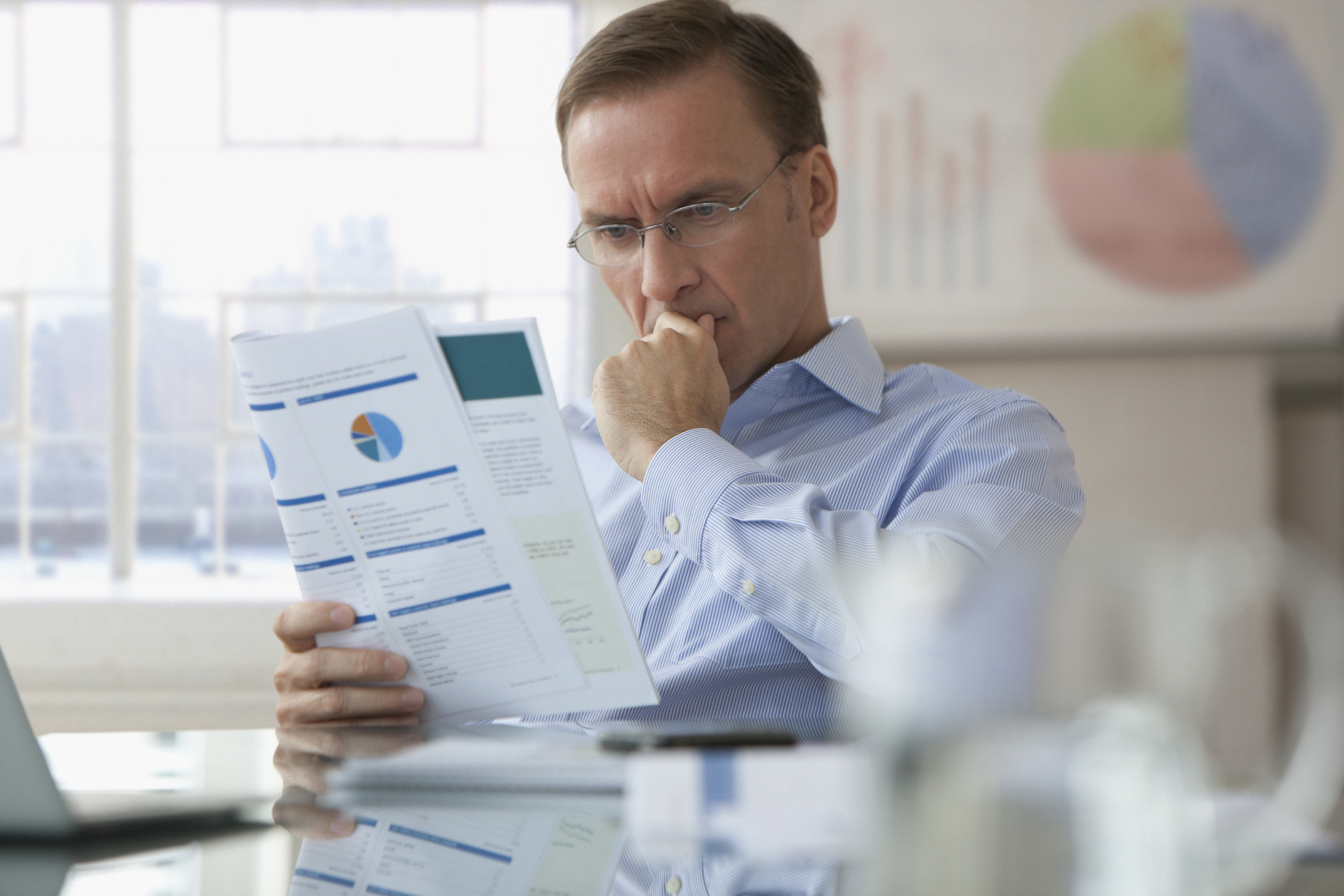 A male venture capitalist reviewing a drug proof of concept