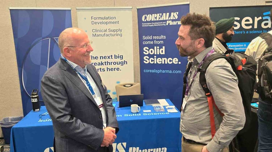 Yves Roy greets an attendee in front of the Corealis booth at the American DDF Summit 2024